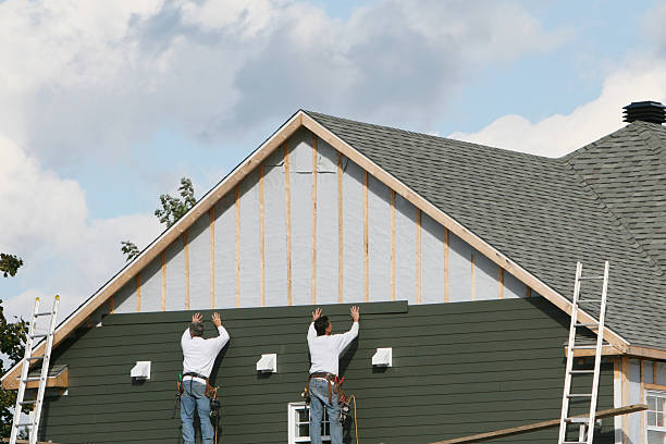 Professional Siding technician working in Englewood, CO